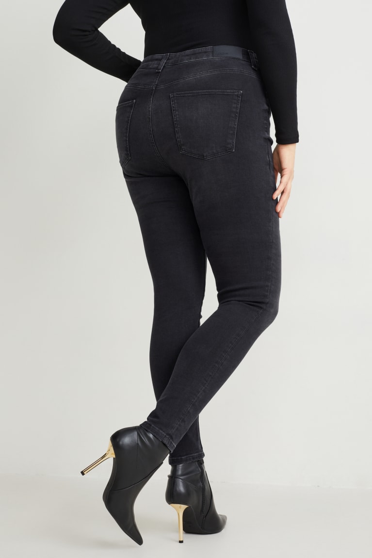 Jeans C&A Curvy High Cintura Flaco Fit Lycra® Recycled Negras | AOPYLF-869