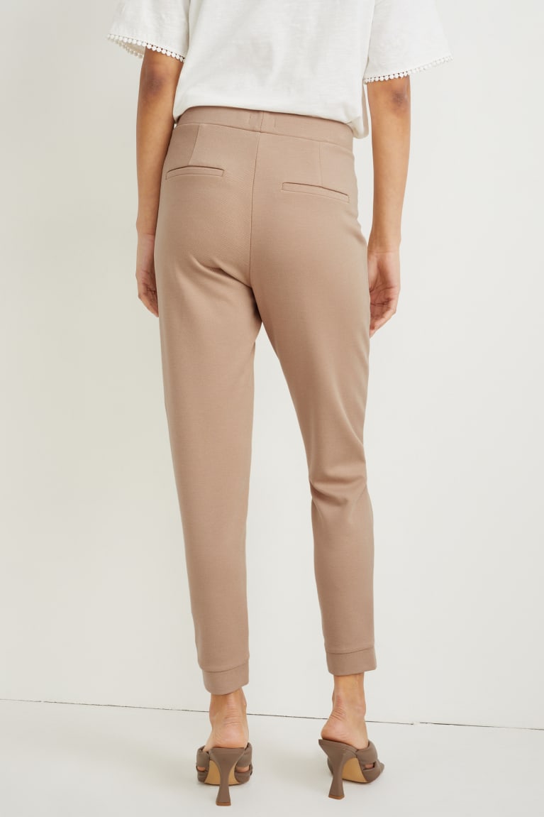 Pantalones C&A Jersey Tapered Fit Beige | ACLBGV-451