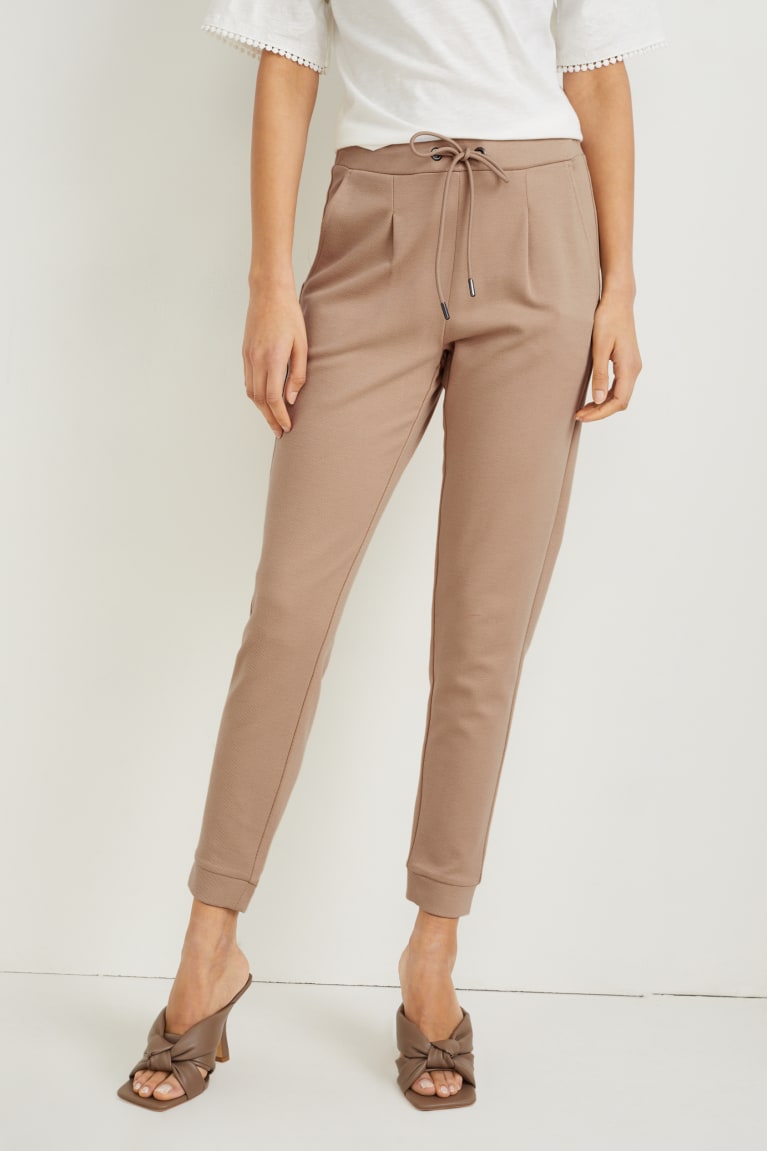 Pantalones C&A Jersey Tapered Fit Beige | ACLBGV-451